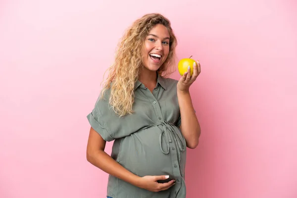 Girl Curly Hair Isolated Pink Background Pregnant Holding Apple Eating —  Fotos de Stock