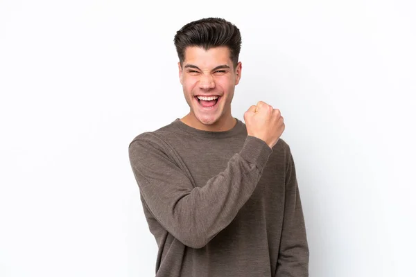 Jovem Homem Caucasiano Bonito Isolado Terreno Panificação Branco Comemorando Uma — Fotografia de Stock