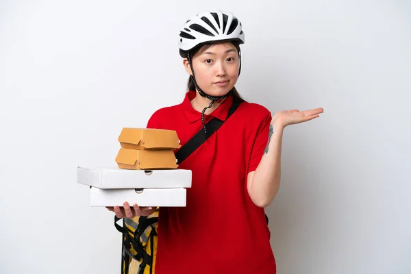 Young Chinese Delivery Woman Taking Takeaway Food Isolated White Background — Fotografia de Stock