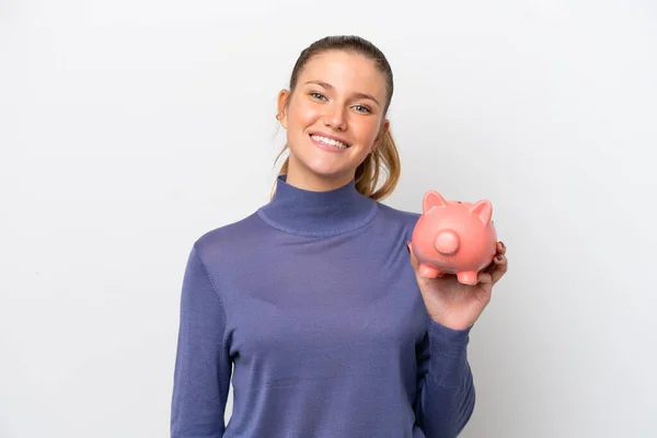 Young Caucasian Woman Holding Piggybank Isolated White Background Smiling Lot — Stockfoto