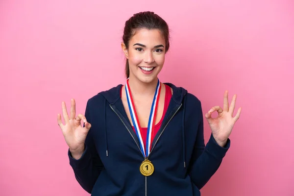 Young Brazilian Sport Woman Medals Isolated Pink Background Showing Sign — Stock Photo, Image