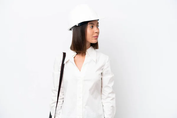 Young Architect Woman Helmet Holding Blueprints Isolated White Background Looking — ストック写真