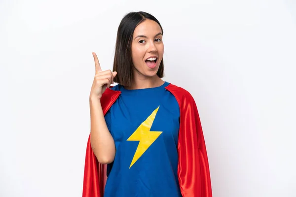 Super Hero caucasian woman isolated on white background thinking an idea pointing the finger up