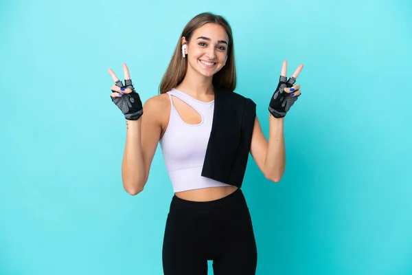 Young Sport Woman Isolated Blue Background Showing Victory Sign Both — Fotografia de Stock