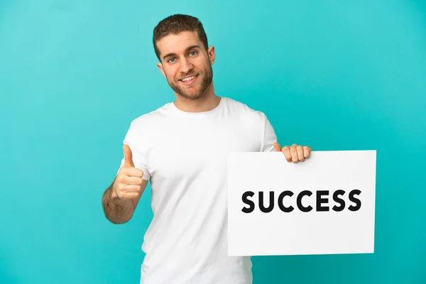 Handsome Blonde Man Isolated Blue Background Holding Placard Text Success — Fotografia de Stock