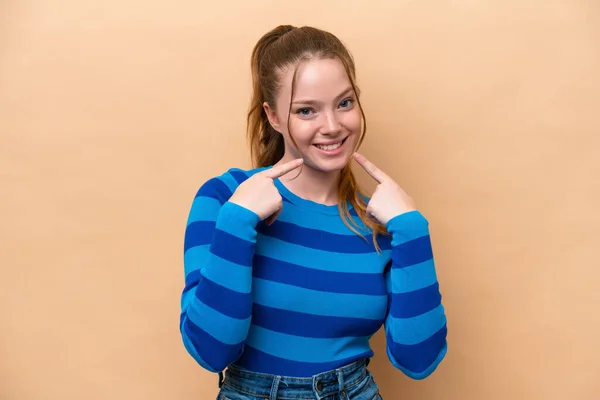 Young Caucasian Woman Isolated Beige Background Giving Thumbs Gesture — Stock Photo, Image