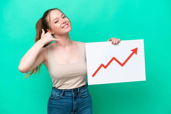 Young Caucasian Woman Isolated Green Background Holding Sign Growing Statistics — Stockfoto