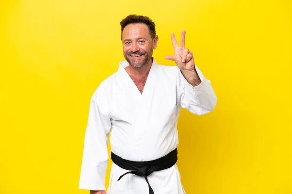 Middle Age Caucasian Man Doing Karate Isolated Yellow Background Happy — Foto de Stock