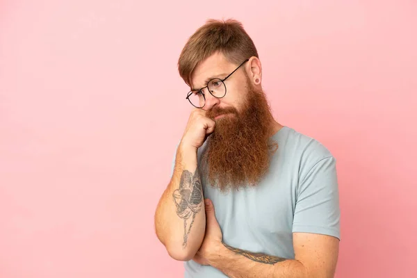 Young Reddish Caucasian Man Isolated Pink Background Tired Bored Expression — Stockfoto