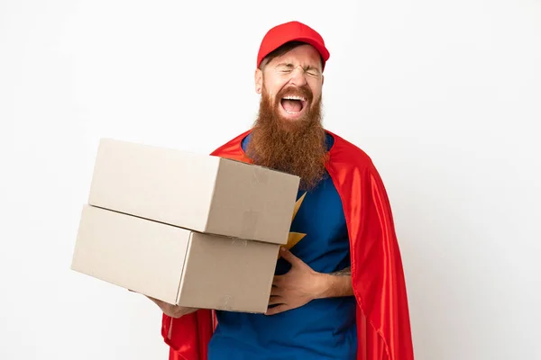 Super Hero delivery reddish man isolated on white background smiling a lot