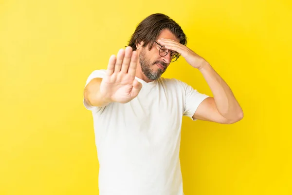 Senior Dutch Man Isolated Yellow Background Making Stop Gesture Covering — Φωτογραφία Αρχείου