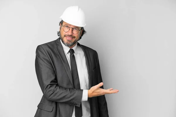Young Architect Man Helmet Isolated Background Presenting Idea While Looking — ストック写真