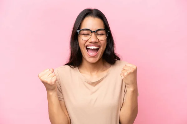 Young Colombian Woman Isolated Pink Background Glasses Celebrating Victory — Foto Stock