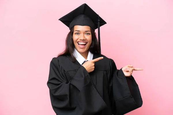Young University Colombian Woman Graduate Isolated Pink Background Surprised Pointing — Φωτογραφία Αρχείου