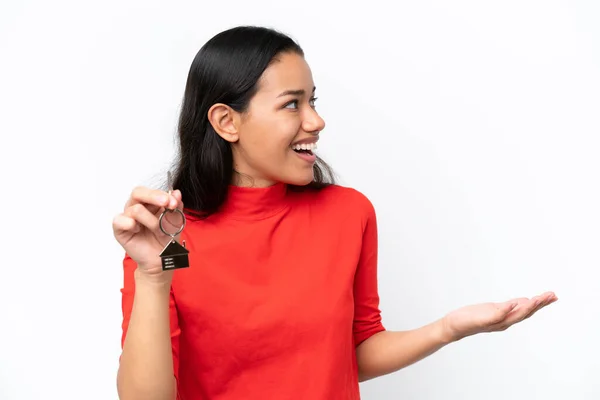 Young Colombian Woman Holding Home Keys Isolated White Background Surprise — ストック写真