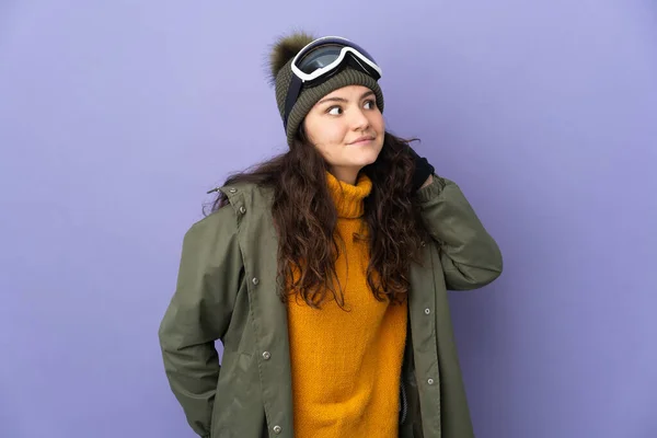 Teenager Russian Girl Snowboarding Glasses Isolated Purple Background Listening Something — Stockfoto