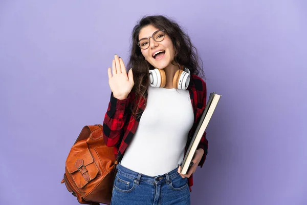 Teenager Student Isolated Purple Background Saluting Hand Happy Expression —  Fotos de Stock