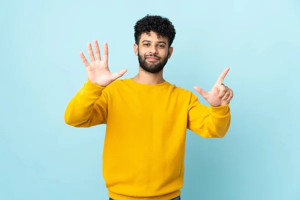 Young Moroccan Man Isolated Blue Background Counting Seven Fingers — Stockfoto