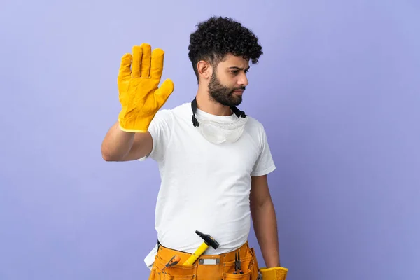 Young Electrician Moroccan Man Isolated Purple Background Making Stop Gesture — Stock Fotó