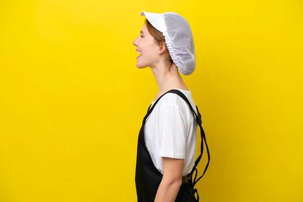 Young English Fisherwoman Isolated Yellow Background Laughing Lateral Position — Stockfoto