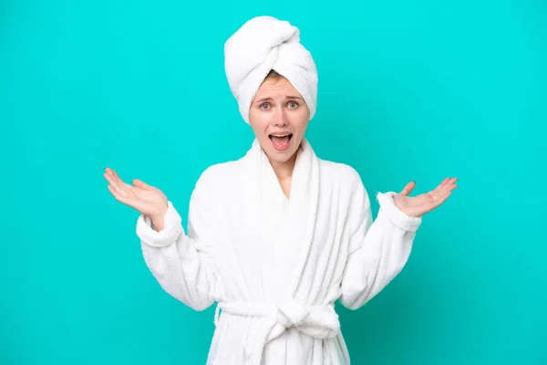 Young Woman Bathrobe Isolated Blue Background Shocked Facial Expression — 图库照片