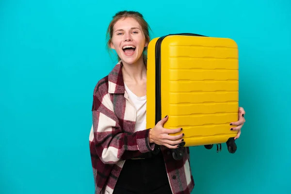 Young English Woman Isolated Blue Background Vacation Travel Suitcase Surprised — Fotografia de Stock
