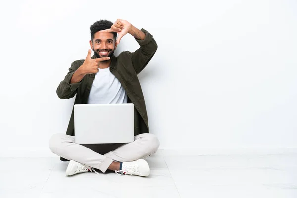 Young Brazilian Man Laptop Sitting Floor Isolated White Focusing Face — 图库照片