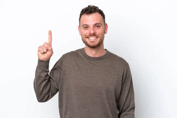 Jovem Brasileiro Isolado Sobre Fundo Branco Apontando Para Uma Grande — Fotografia de Stock