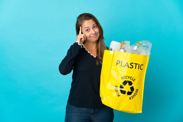 Middle Age Brazilian Woman Holding Bag Full Plastic Bottles Recycle — Stockfoto