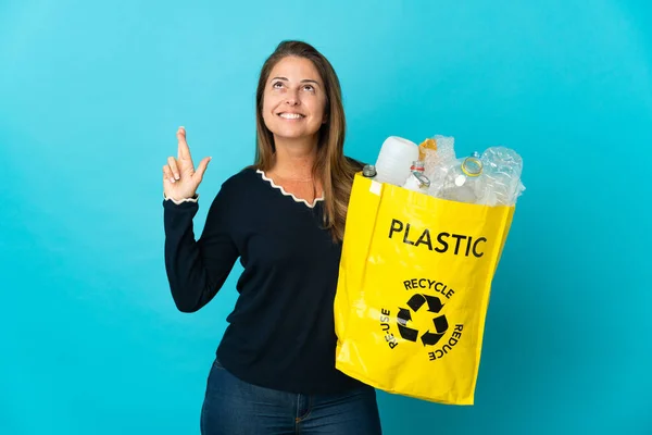 Middle Age Brazilian Woman Holding Bag Full Plastic Bottles Recycle — Stockfoto