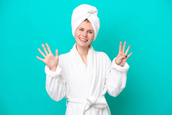 Young Woman Bathrobe Isolated Blue Background Counting Nine Fingers — 图库照片