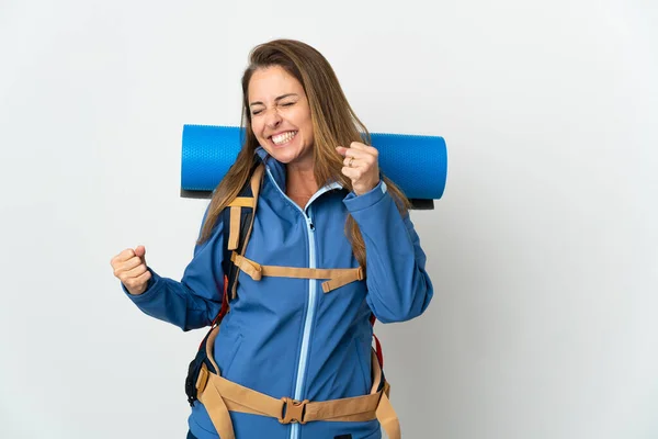 Middle Age Mountaineer Woman Big Backpack Isolated Background Celebrating Victory —  Fotos de Stock