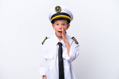 Little airplane pilot boy isolated on white background with surprise and shocked facial expression