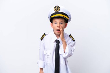 Little airplane pilot boy isolated on white background shouting with mouth wide open