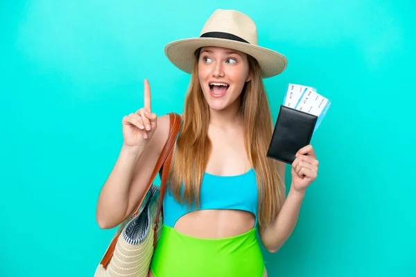 Traveler Caucasian Woman Holding Passport Isolated Blue Background Intending Realizes — Stockfoto