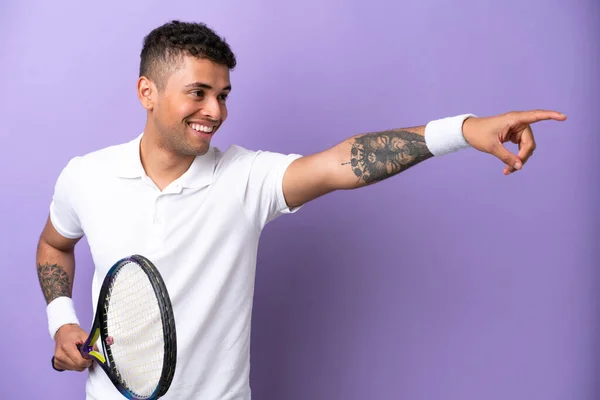 Young Brazilian Man Isolated Purple Background Playing Tennis — ストック写真