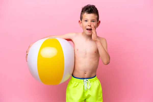 Little Caucasian Boy Holding Beach Ball Isolated Pink Background Shouting — Foto de Stock