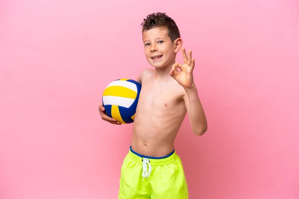 Little Caucasian Boy Playing Volleyball Isolated Pink Background Showing Sign —  Fotos de Stock
