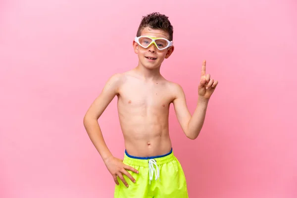 Little Caucasian Boy Wearing Diving Goggles Isolated Pink Background Showing — 스톡 사진