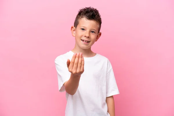 Little Caucasian Boy Isolated Pink Background Inviting Come Hand Happy — Photo