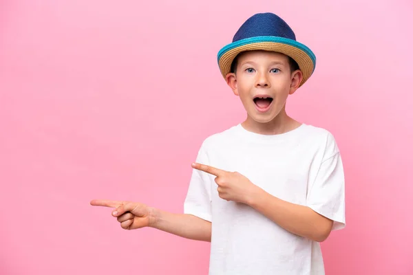 Little Caucasian Boy Wearing Hat Isolated Pink Background Surprised Pointing — Fotografia de Stock