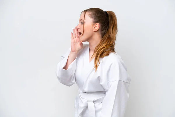 Young Caucasian Girl Doing Karate Isolated White Background Shouting Mouth — Stock Photo, Image