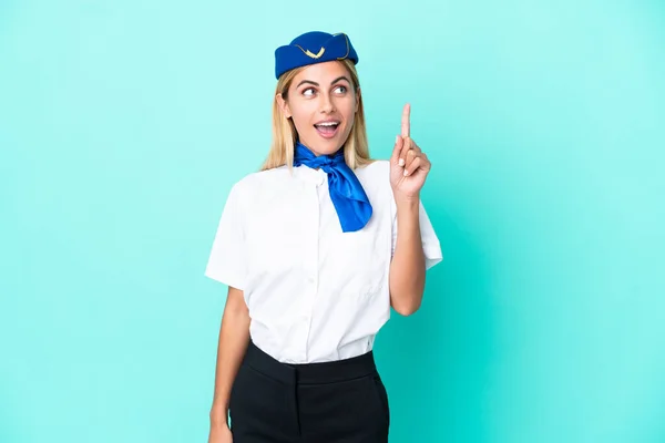 Airplane Stewardess Uruguayan Woman Isolated Blue Background Thinking Idea Pointing — Foto de Stock
