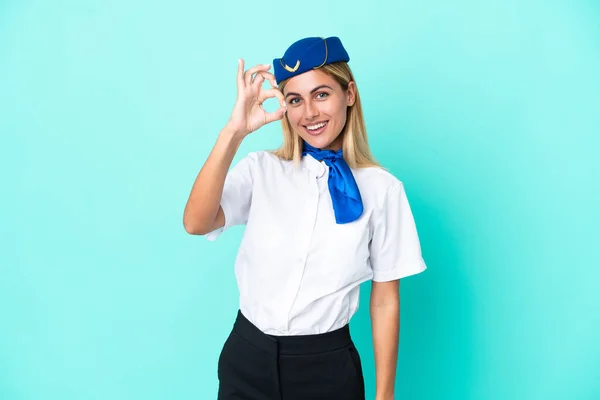 Airplane Stewardess Uruguayan Woman Isolated Blue Background Showing Sign Fingers — Zdjęcie stockowe