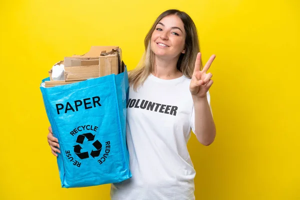 Young Rumanian Woman Holding Recycling Bag Full Paper Recycle Isolated — ストック写真