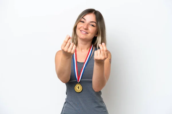 Young Rumanian Woman Medals Isolated White Background Making Money Gesture — Stock Photo, Image