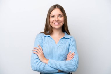 Young Lithuanian woman isolated on white background keeping the arms crossed in frontal position