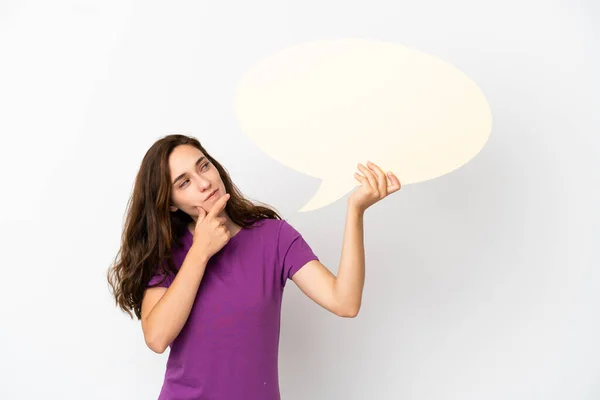 Young Caucasian Woman Isolated White Background Holding Empty Speech Bubble — стоковое фото