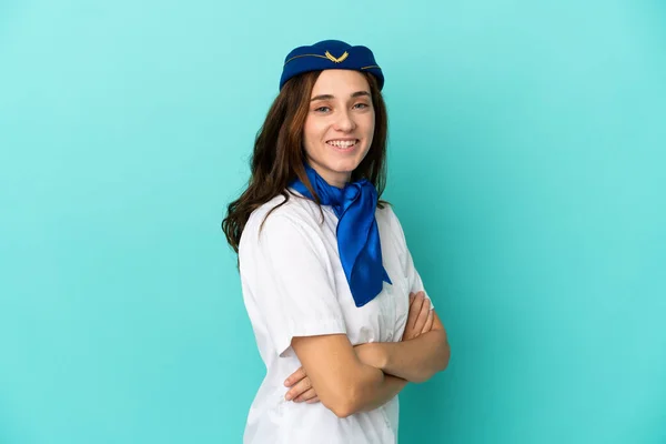 Airplane Stewardess Woman Isolated Blue Background Arms Crossed Looking Forward — Photo