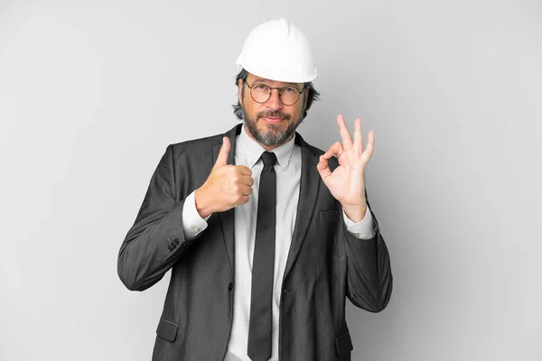 Young Architect Man Helmet Isolated Background Showing Sign Thumb Gesture — ストック写真